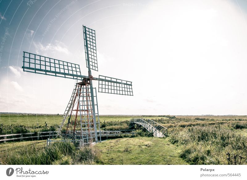 Wind mill Industry Technology Culture Environment Nature Landscape Sky Clouds Autumn Grass Park Meadow Building Architecture Old Historic Retro Blue Green