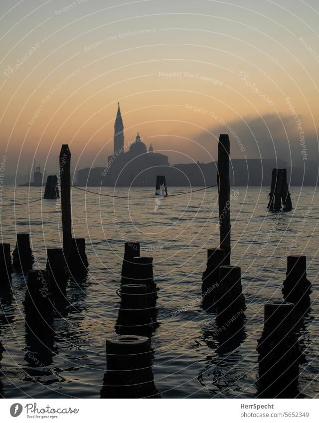 Morning atmosphere in Venice with stakes in the water and San Giorgio Maggiore Gondola (Boat) Italy Exterior shot Old town Port City Channel Tourism Watercraft