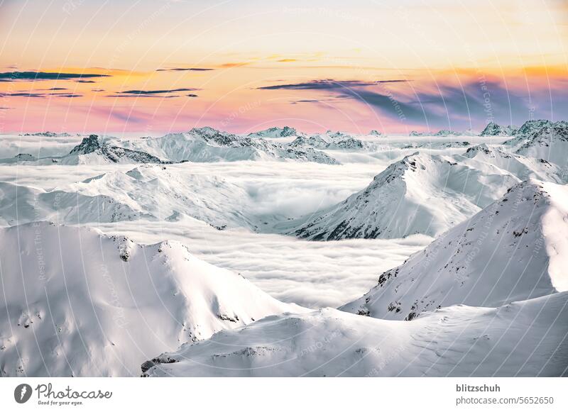 When the sun rises in the Alps. Sea of fog and freshly snow-covered mountains Switzerland Swiss Alps alps Suisse lenzerheide Grisons Mountain Vacation & Travel