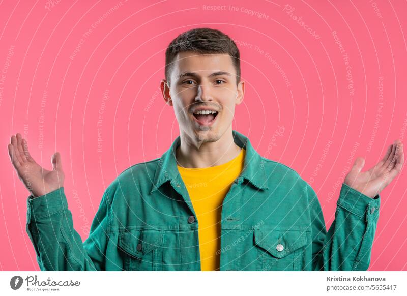 Shocked man glad, he screaming WOW. Impressed guy trying to get attention excited caucasian isolated surprise wow amazed funny shocked background celebrate