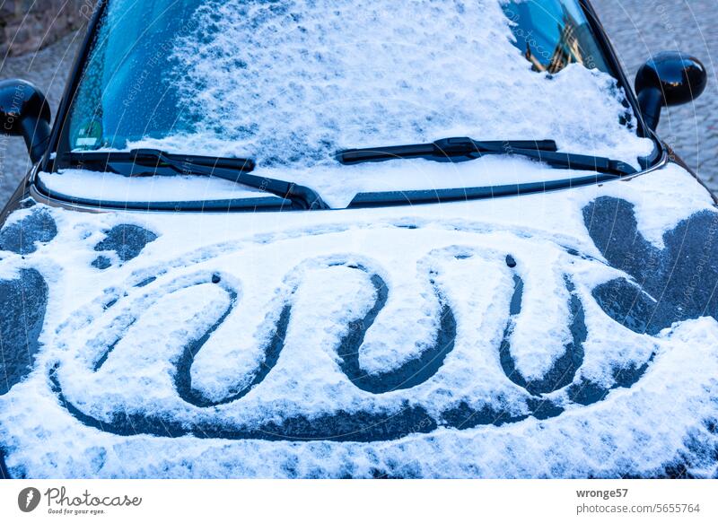 Car hood decorated with snow and finger painting Snow Car Hood Winter Windscreen Cold cold season Frost Finger drawing car Weather chill Winter mood