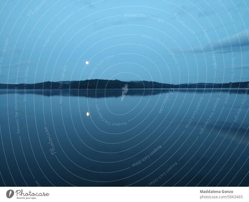 full moon reflection over calm canadian lake clouds blue Night Moon Moonlight Night sky Moody Nature Mysterious Light Moonrise Silhouette Mystic Calm