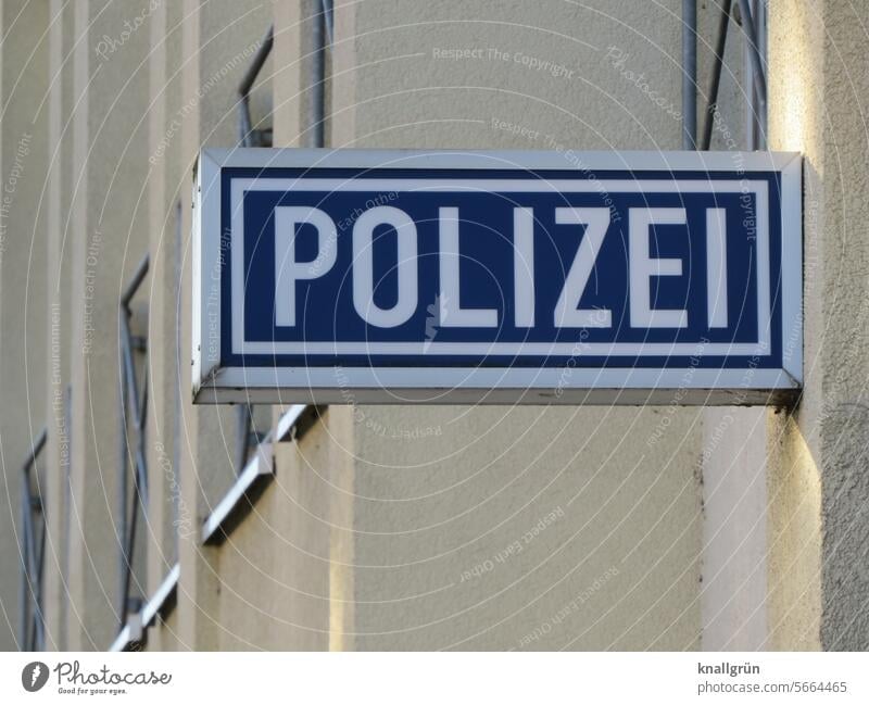 police Police Force Signs and labeling Text Characters Colour photo Signage Letters (alphabet) Word Deserted Exterior shot Typography Communication writing