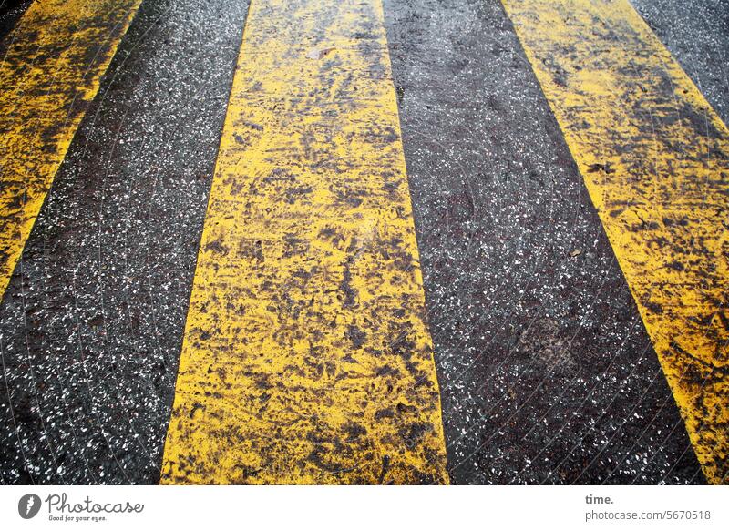 melting of snow Zebra crossing off Intersection Transport Road traffic Sign symbols lines Stripe slush Snow mud Thaw Wet Damp Yellow Black filth Asphalt Street