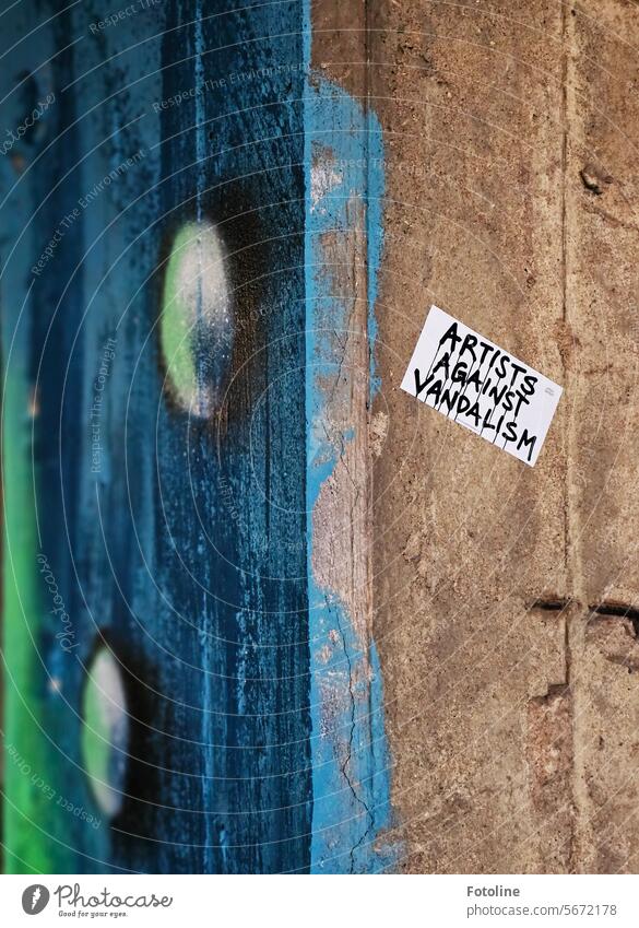 ARTISTS AGAINST VANDALISM - Artists against vandalism - this sticker is stuck next to the artwork of a street artist. stickers Graffiti Wall (barrier)