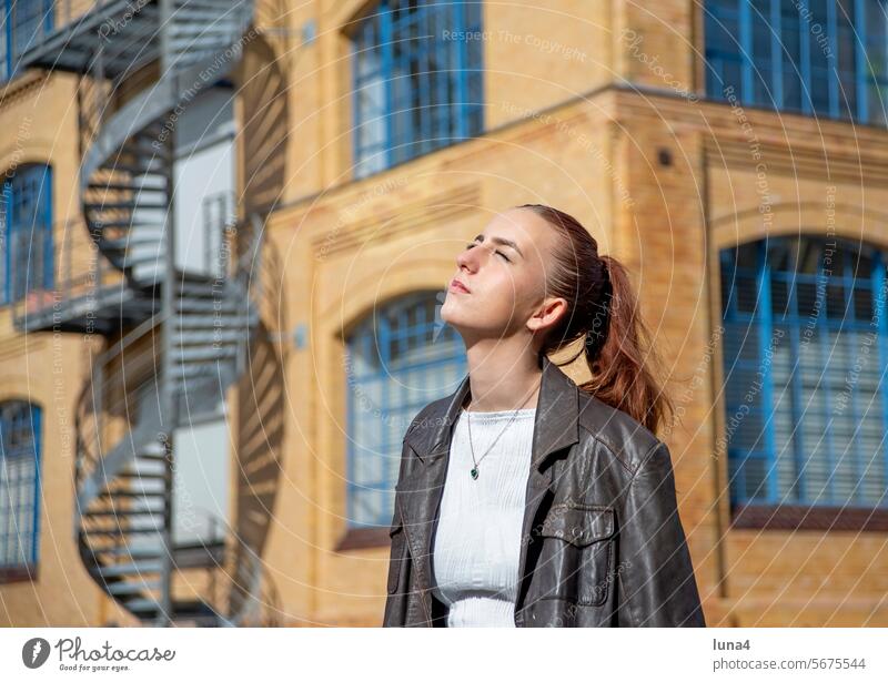 young woman with leather jacket enjoys the evening sun Woman Girl sunbathe teenager Sun To enjoy Autumn fortunate Joy untroubled Joie de vivre (Vitality)