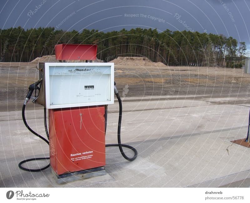 lonely gas pump Petrol pump Loneliness Refuel Spirit Petrol station Diesel Red Contrast Far-off places
