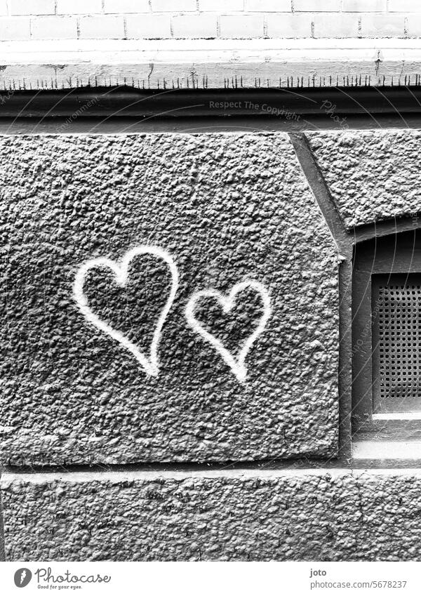 Two painted hearts on a house wall Heart Heart-shaped heart-shaped Love Declaration of love Romance Loyalty affectionately Infatuation In love Personal