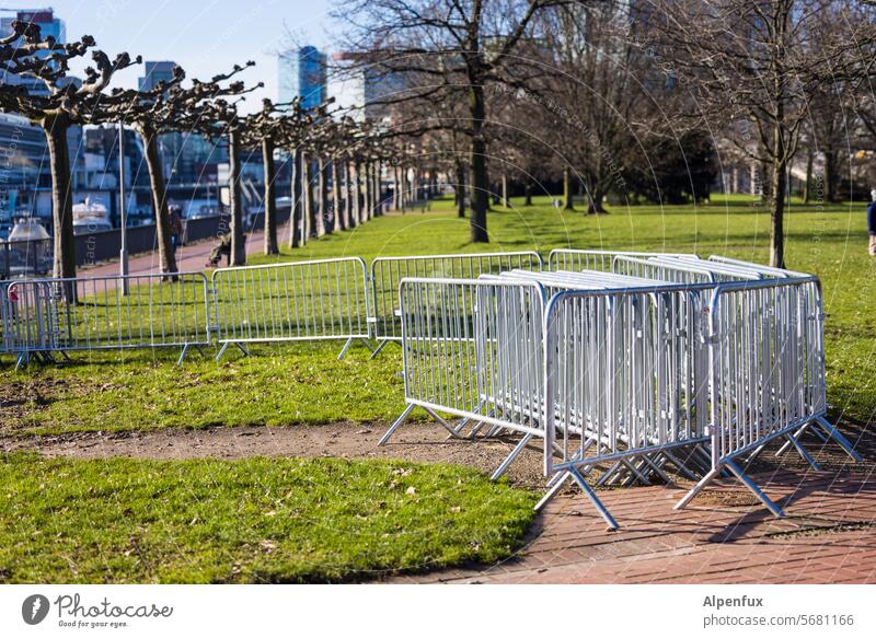 Barriers form a chain of bars against the right cordon Safety Grating Fence Protection Structures and shapes Hoarding Metal Metalware Pattern Construction site