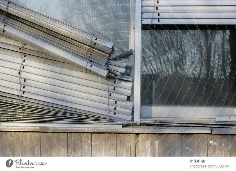 Window with damaged roller shutter Roller shutter Broken corrupted Facade Venetian blinds Architecture Roller blind Structures and shapes