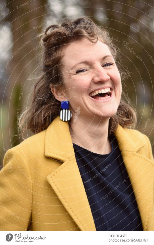 zest for life Woman 30 - 40 years Curl Blonde Yellow Earring Laughter Joy Adults Colour photo Contentment Exterior shot Human being Happiness Happy naturally