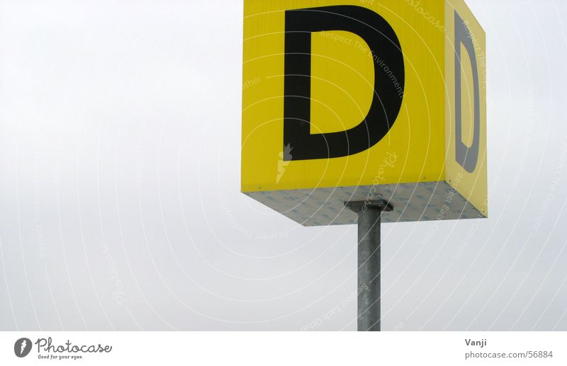 Thick D Letters (alphabet) Yellow Signs and labeling Airport
