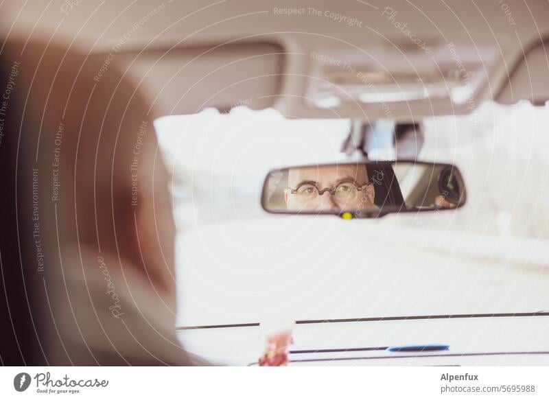 Man shows consideration Rear view mirror eyes Reckless Car Mirror Transport Street Driving Vehicle Reflection Motoring look back