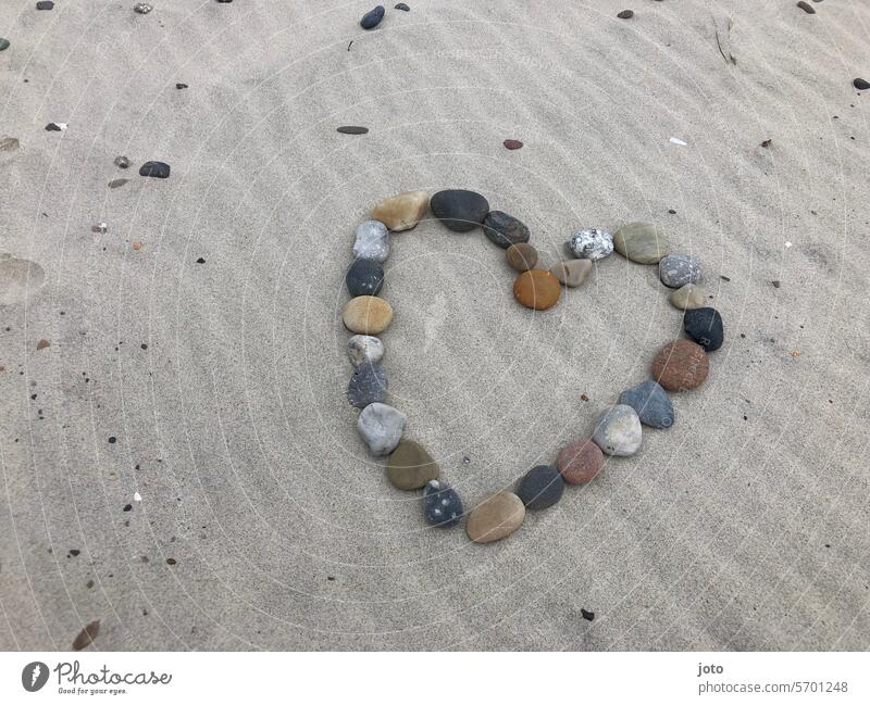 Colorful heart made of stones on an undulating sandy beach Heart Heart-shaped heart-shaped Love Sandy beach wavy Wavy line Beach Vacation good wishes