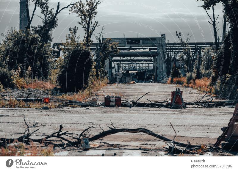 burnt cars and destroyed buildings of the workshop of the Azovstal plant in Mariupol Russia Ukraine abandon attack blackout blown up bombardment broken