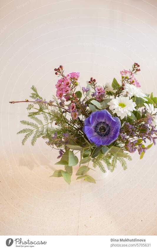 Floral violet-white beautiful background. Flower composition. Bouquet of  flowers from light purple roses. Close-up. Nature. Stock Photo