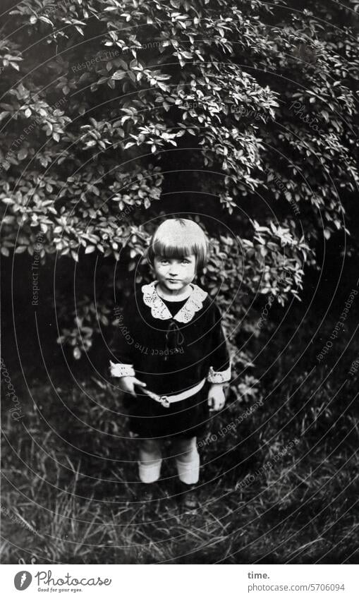 Child in the garden portrait Full-length Tree bush Meadow Blonde Nature Environment klamotte Bad mood