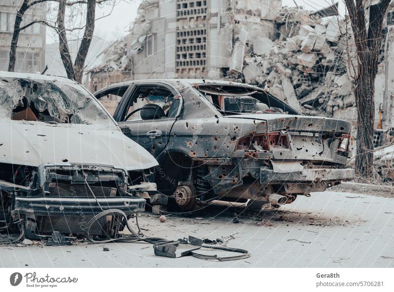 damaged and looted cars in a city in Ukraine during the war Donetsk Kherson Lugansk Mariupol Russia Zaporozhye abandon abandoned attack blown up bombardment