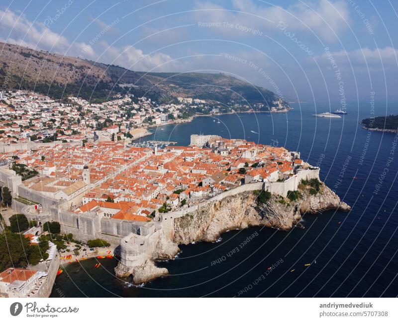 Aerial view of rooftops of Dubrovnik old historical town and Adriatic sea in Croatia. UNESCO World Heritage site, Famous tourist attraction. Vacation and adventure