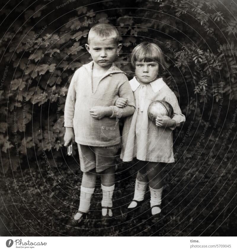 Siblings with toys Boy (child) Girl Ball Hedge Garden hooked Stand Moody Earnest Sock then Former portrait garments