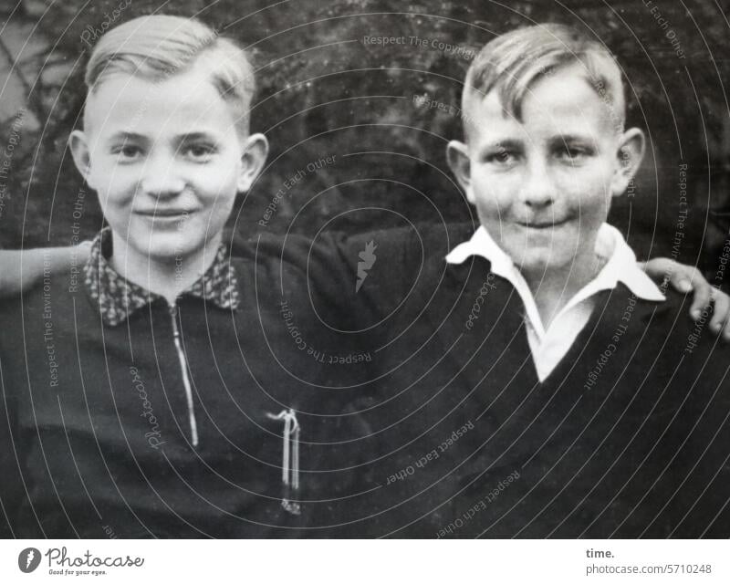 one more like the other Boy (child) Stand then Former portrait garments Looking into the camera Nostalgia Smiling Friendship Embrace two youthful hairstyle