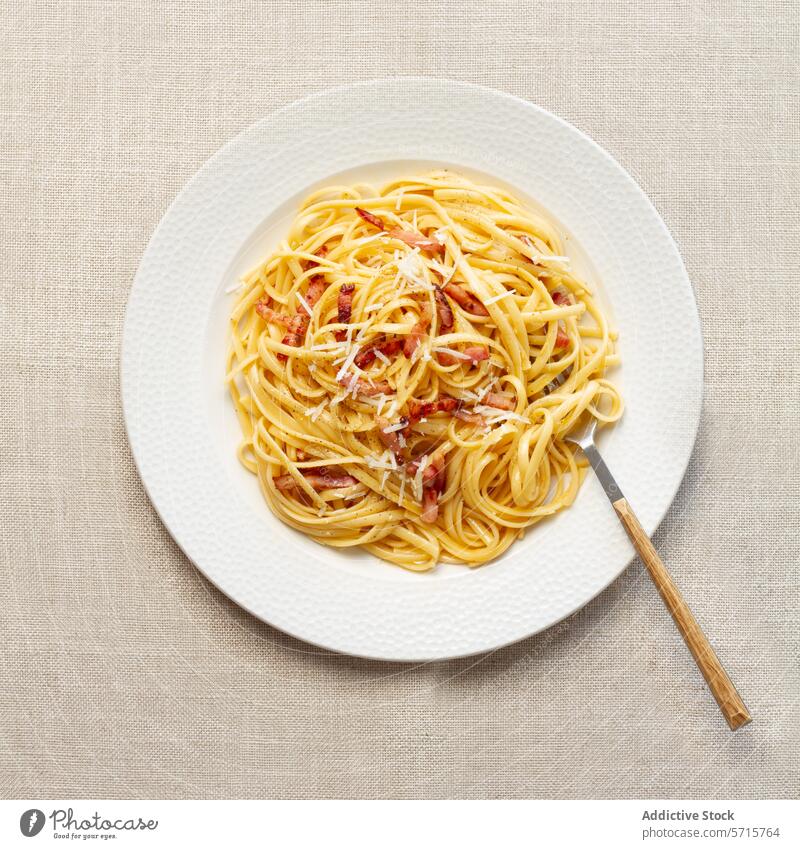 Classic Spaghetti Carbonara on White Plate spaghetti carbonara pasta italian traditional white plate cheese grated cured meat dish meal top view gourmet food