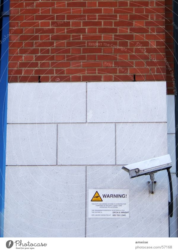 Warning 01 Surveillance Wall (barrier) Tower Bridge Repression Exterior shot Camera Signs and labeling Stone day and night Warning label