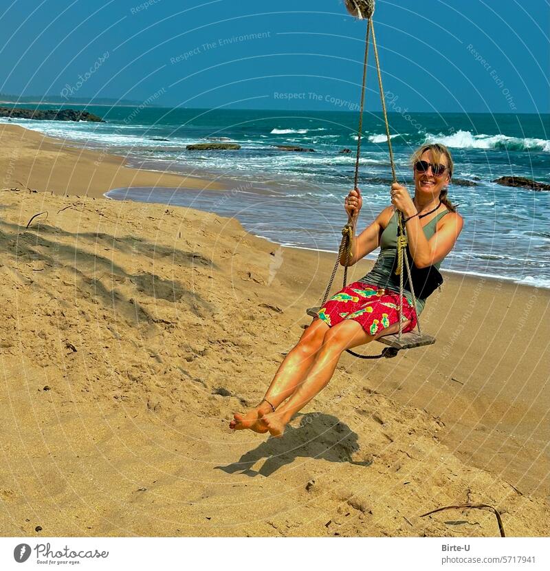 Woman on a beach swing To swing Joie de vivre (Vitality) Exterior shot Happy Happiness fun Summer Sun Nature Movement enjoyment Ease Sri Lanka Asia coast travel