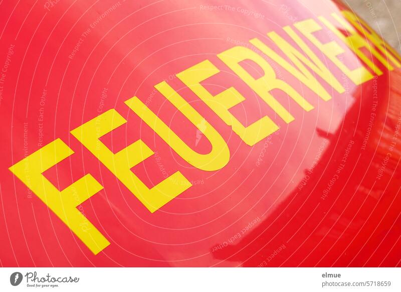 FEUERWEHR is written in full format on a red emergency vehicle / rescue service Fire department Rescue service Help Fire engine Red Alarm tatütata Emergency