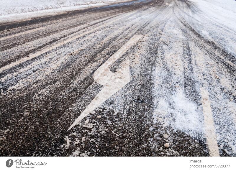 left turn-off Smoothness Transport Traffic infrastructure Pavement Street Road traffic Black ice winter weather Direction Cold Arrow Sign Snowfall Ice