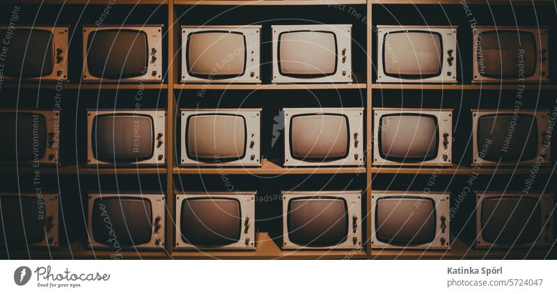 A wall with CRT monitors tube monitor Screens TV set Television, television Wall (building) Technology Media Media industry Entertainment electronics