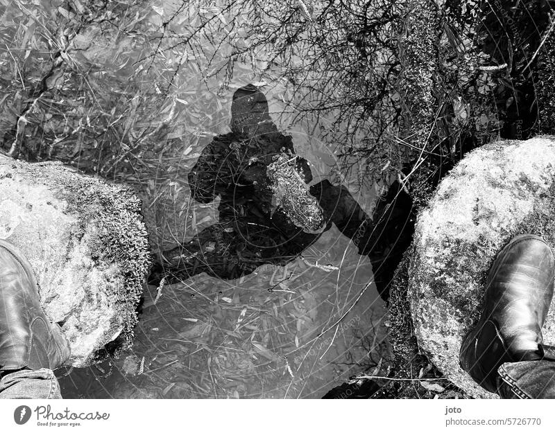 Person reflected in the water reflection Reflection in the water Autumn Autumnal Black & white photo Silhouette Shadow play melancholy Lines and shapes