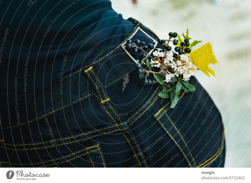 The waist of a woman with flowers in her jeans pocket Woman Jeans Human being Feminine Adults feminine behind Black Bouquet daffodil Denim bag Stitching quilted
