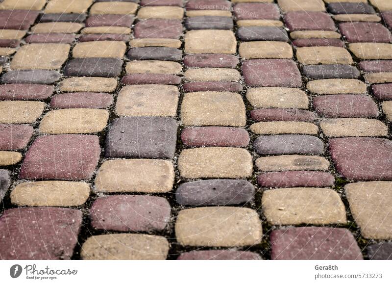 texture of colored brushes architecture background black blank block blocks brick bright brown cobble cobblestone cobblestones pattern colored paving stones