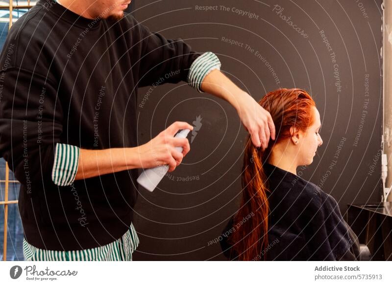 Hairstylist preparing client's hair in salon hairstylist hair salon styling preparation spray woman professional grooming beauty fashion care treatment