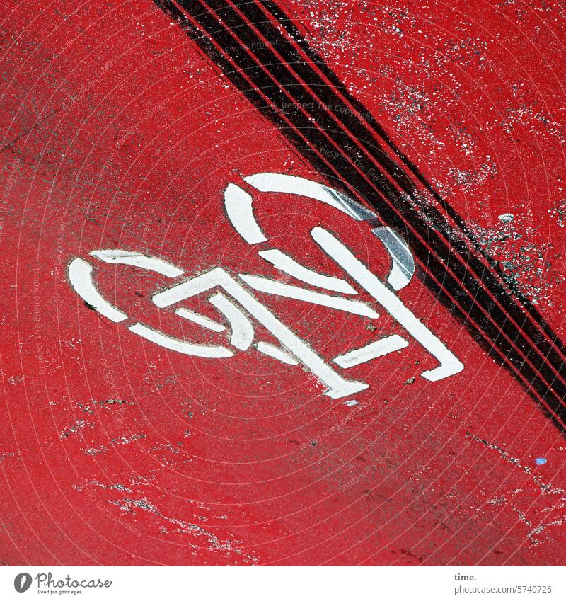 pretty freaky Cycle path Skidmark Red Coating Border crossing Pictogram Concrete Asphalt Colour sprayed Appropriation violation territory Sand