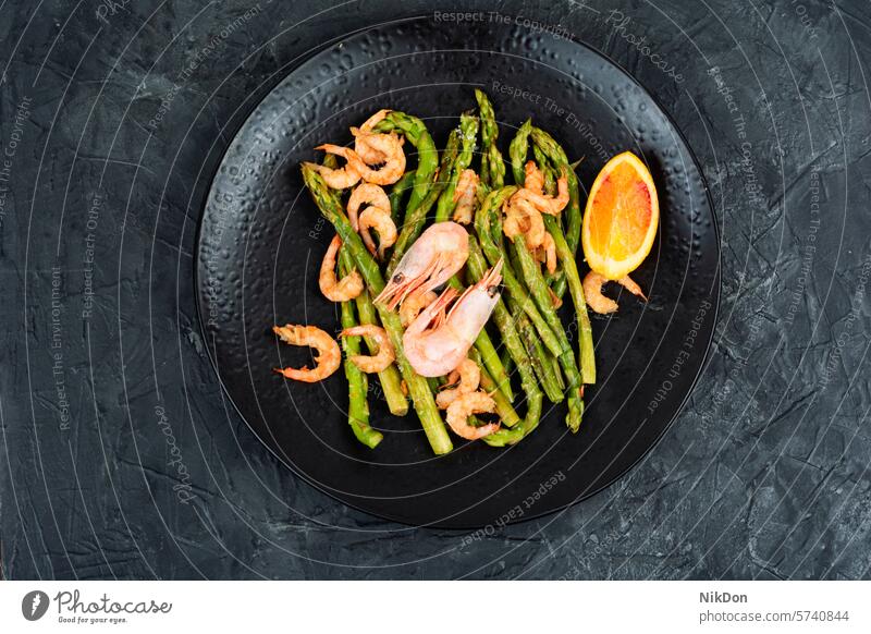 Shrimp with young boiled asparagus. shrimp food vegetable prawn seafood healthy green cuisine salad plate cooking diet appetizer cooked herb fried flat lay