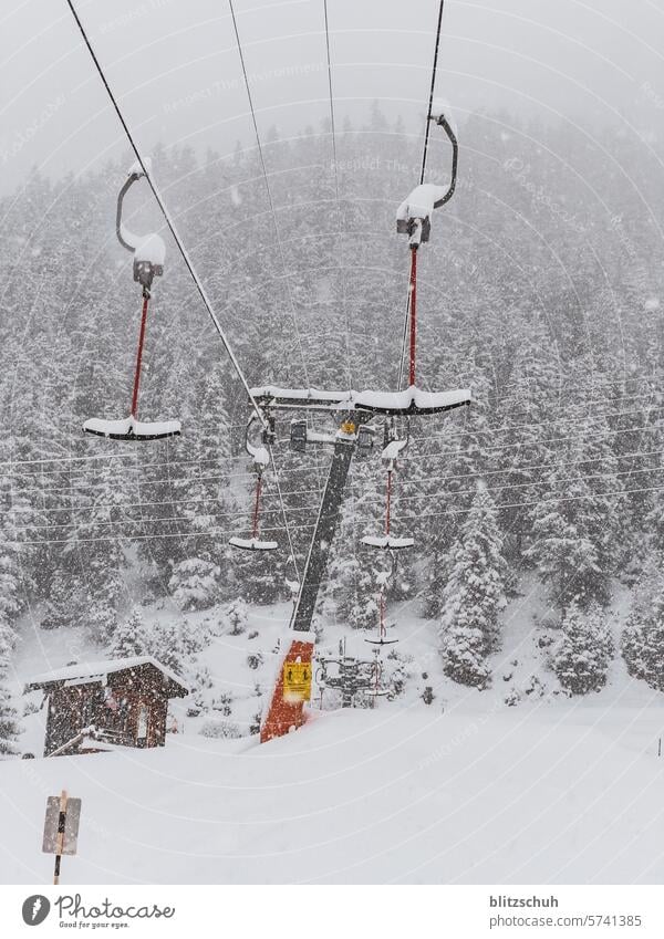 Anchor lift during snowfall anchor lift Winter Snow Mountain Snowscape Ski run Ski resort Alps Winter sports Winter vacation Vacation & Travel Switzerland