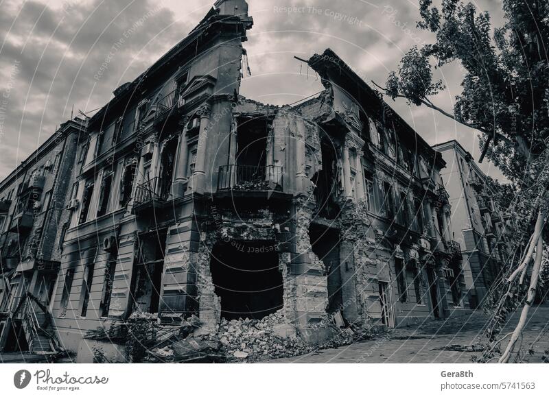 destroyed and burned houses in the city during the war in Ukraine - a ...