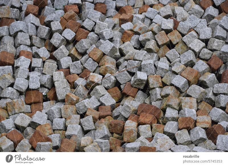 Paving stone piled up stones pavement paving stone Heap quantity Structures and shapes Road construction Gray