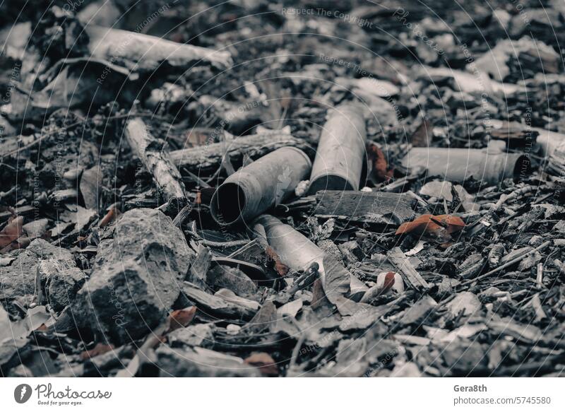 shell casings after a shooting battle in Ukraine Russia Ukrainian abandon abandoned army attack background blown up bombardment broken burned out caliber