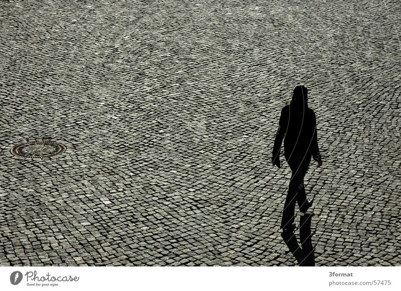 pavement Pedestrian Gully Woman Pavement Pattern Loneliness Grief Doomed Direction Exterior shot Traffic infrastructure Cobblestones Shadow Silhouette Level