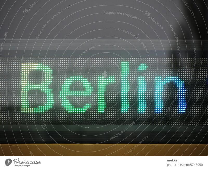 Berlin Capital city Town Germany City writing neon sign colored Prismatic colors Ticker LED pixels Digital Screen Window Clue publicity Advertising reflection