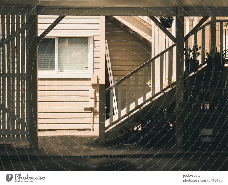 Symmetrical wooden house between light and shadow Wooden house House (Residential Structure) Window Stairs Sunlight Shadow Wall (building) Facade Architecture