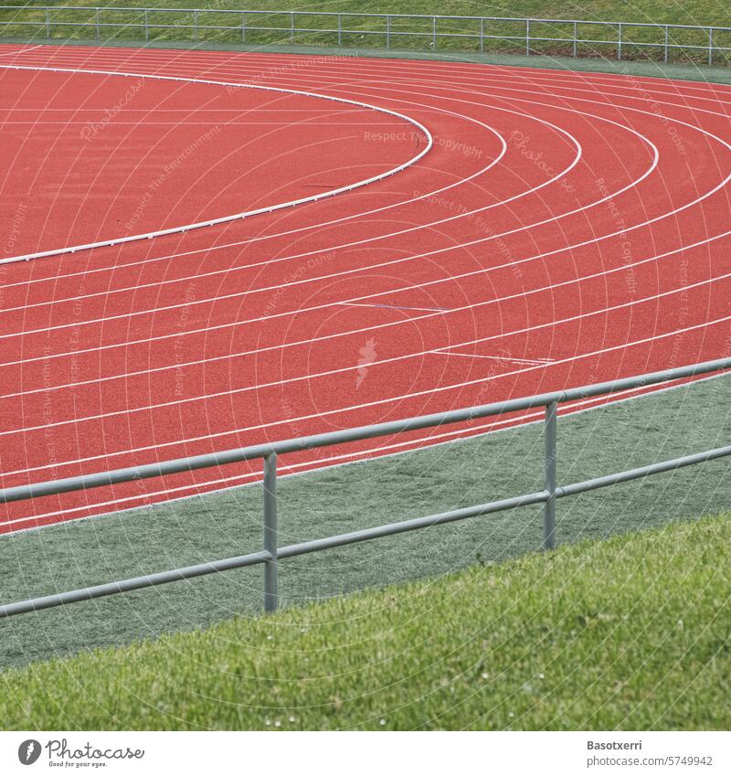 Detailed view of an athletics stadium: curve of a running track Track and Field athletics track Running track Sports competitive sports gravel School sport