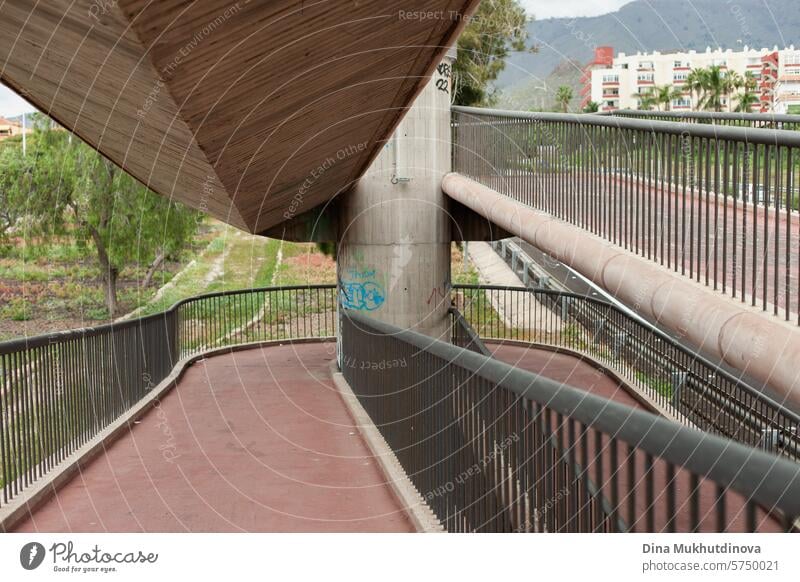 pedestrian bridge accessible for wheelchair at Tenerife, Canary Islands, Spain. Urban planning. Roads and highway infrastructure. walk safety zebra aerial
