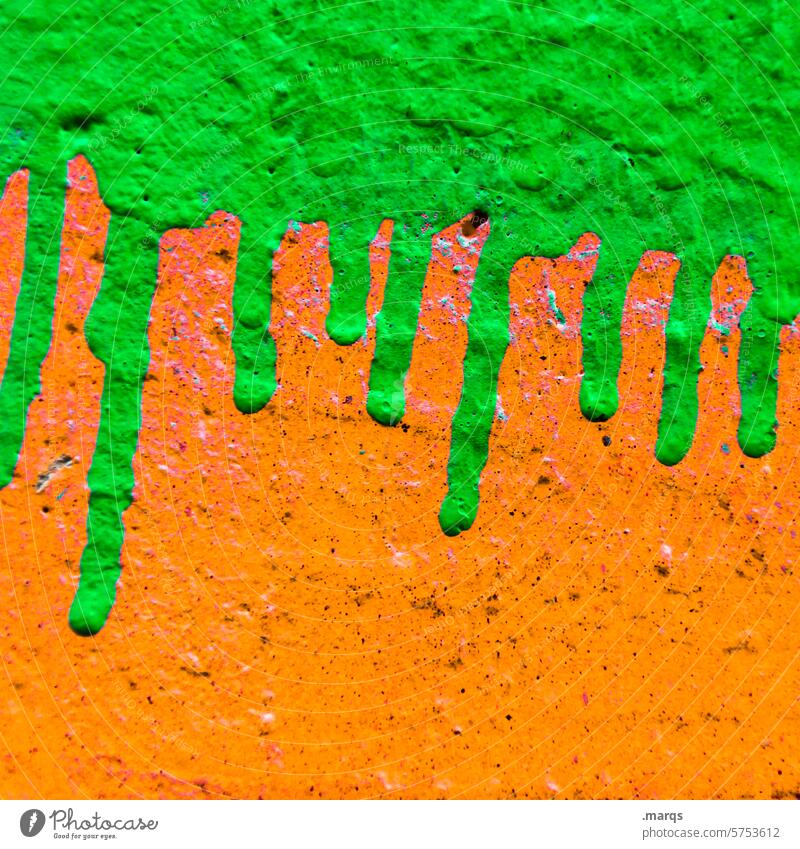 Green over orange colour noses Colour Wall (building) Dye Close-up Structures and shapes Abstract Fluid Drop Orange Contrast