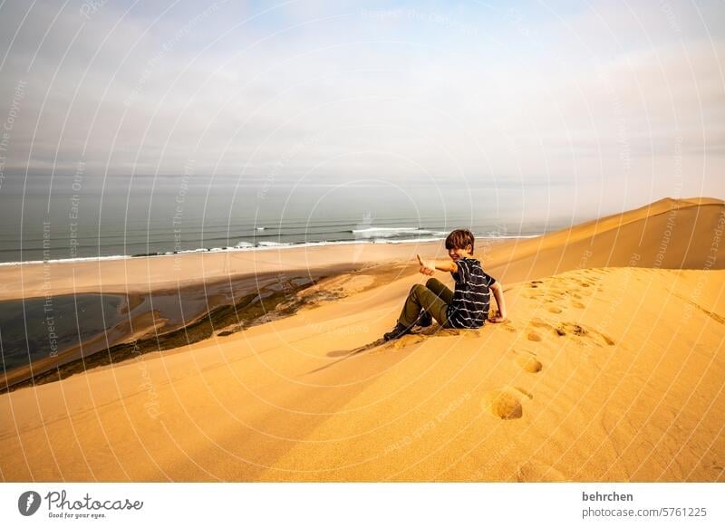 butter soft | seat cushion Dream Marvel outlook Vantage point Infancy Son Boy (child) Namibia Africa Desert Sand Ocean ocean wide Far-off places Longing travel