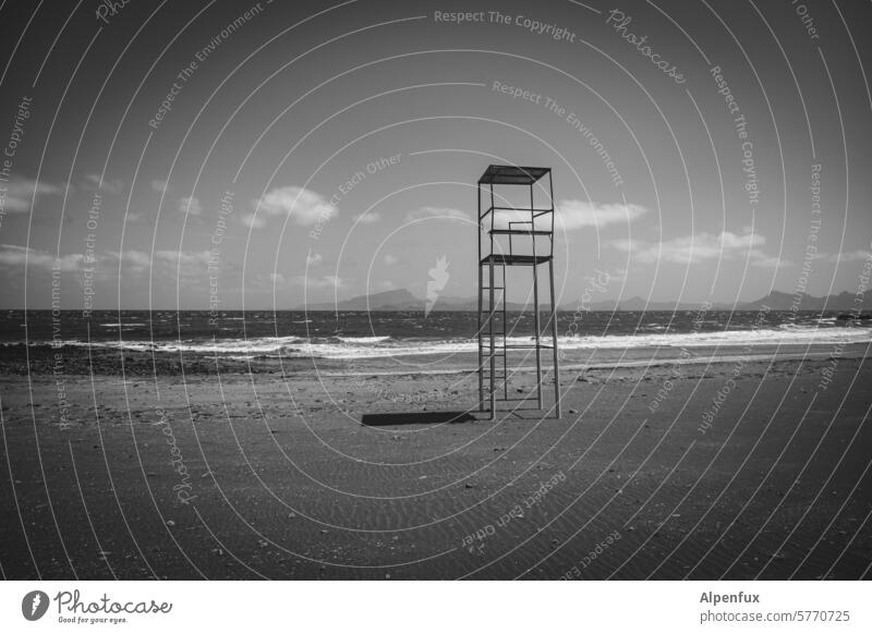 Rescue tower by the sea black and white Beach Lifeguard Vacation & Travel coast Swimming & Bathing Tower rescue tower Sky Summer vacation Water Ocean Cabo Verde