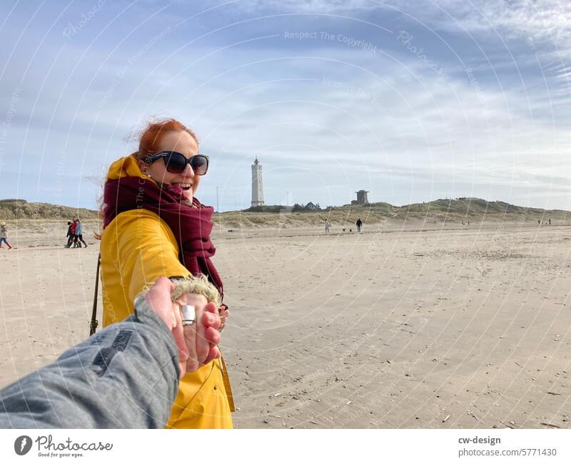 Hand in hand in Blåvand Blavand Beach Denmark Couple Vacation & Travel hold hands